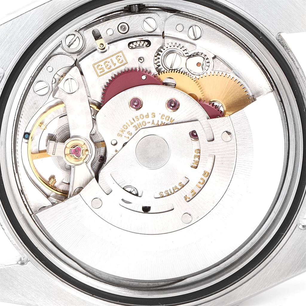 This image shows a close-up of the movement mechanism inside a Rolex Datejust 116233 Men's Stainless Steel Mother of Pearl Dial 116233 Men's Stainless Steel Mother of Pearl Dial watch.