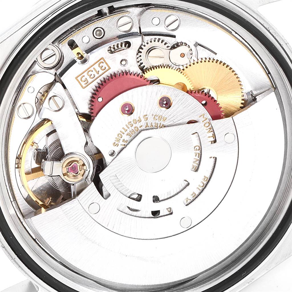 This image shows the movement and inner mechanisms of a Rolex Datejust 16233 Men's Steel and Gold (two tone) Champagne Dial 16233 Men's Steel and Gold (two tone) Champagne Dial watch viewed from the back.