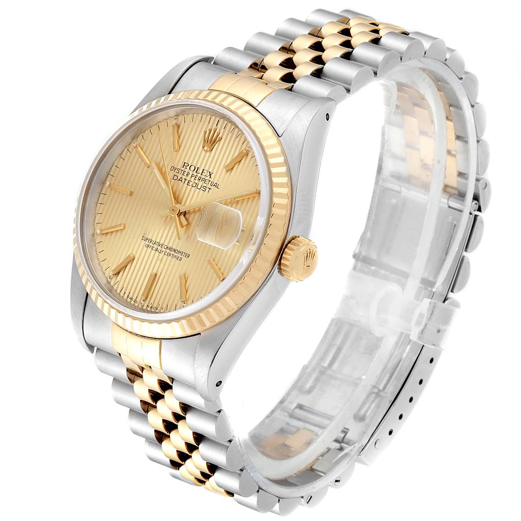 The Rolex Datejust 16233 Men's Steel and Gold (two tone) Champagne Dial 16233 Men's Steel and Gold (two tone) Champagne Dial watch is shown at an angle highlighting its gold and silver case, dial, and Jubilee bracelet.
