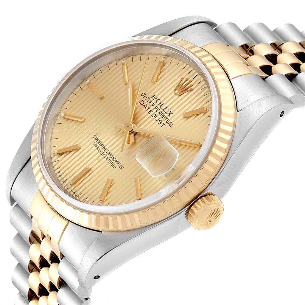 The image shows a close-up angled view of the dial, bezel, crown, and part of the bracelet of a Rolex Datejust 16233 Men's Steel and Gold (two tone) Champagne Dial 16233 Men's Steel and Gold (two tone) Champagne Dial watch.