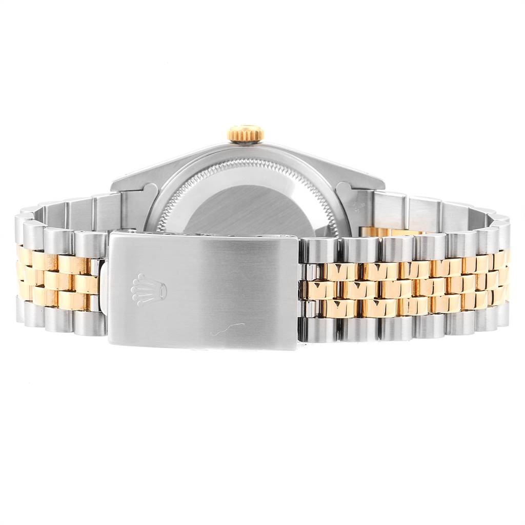 This image shows the back view of a Rolex Datejust 16233 Men's Steel and Gold (two tone) Champagne Dial 16233 Men's Steel and Gold (two tone) Champagne Dial watch, including its case back and two-tone bracelet with clasp.