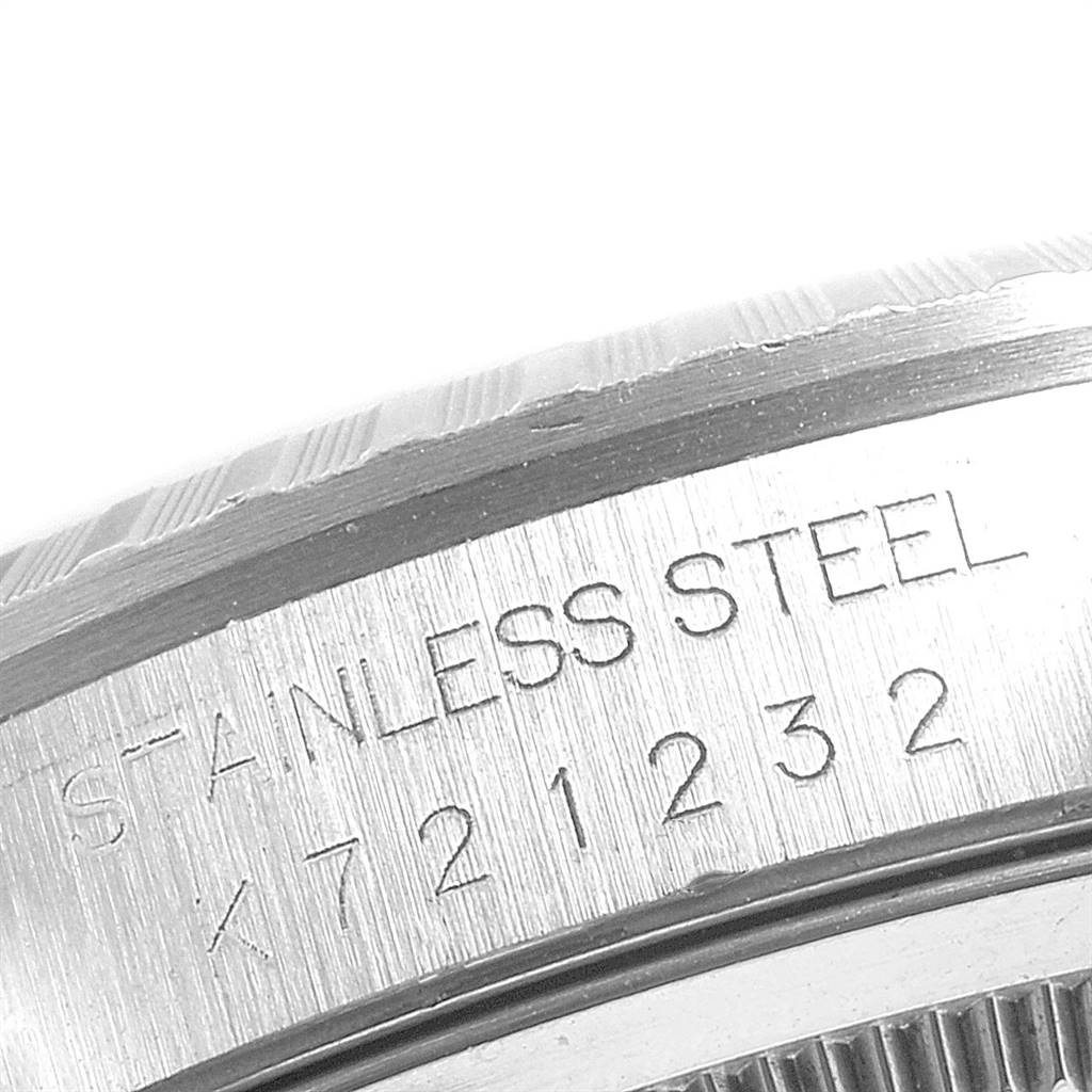 The image shows a close-up view of the stainless steel back of a Rolex Datejust 16220 Men's Stainless Steel Silver Dial 16220 Men's Stainless Steel Silver Dial watch with its model number.