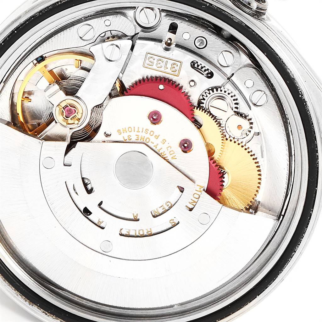 This image shows the inner mechanism and components of a Rolex Datejust 16220 Men's Stainless Steel Silver Dial 16220 Men's Stainless Steel Silver Dial watch at a close-up angle.