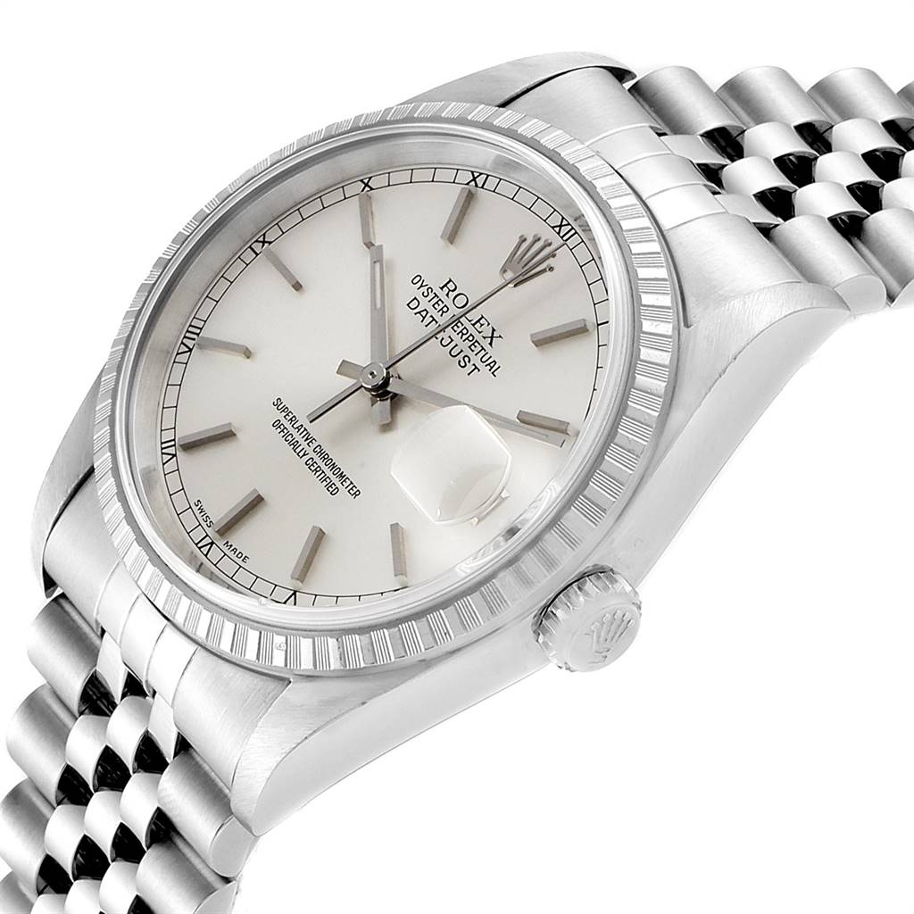 The image shows a close-up of a Rolex Datejust 16220 Men's Stainless Steel Silver Dial 16220 Men's Stainless Steel Silver Dial watch at an angle, highlighting the dial, bezel, crown, and part of the bracelet.