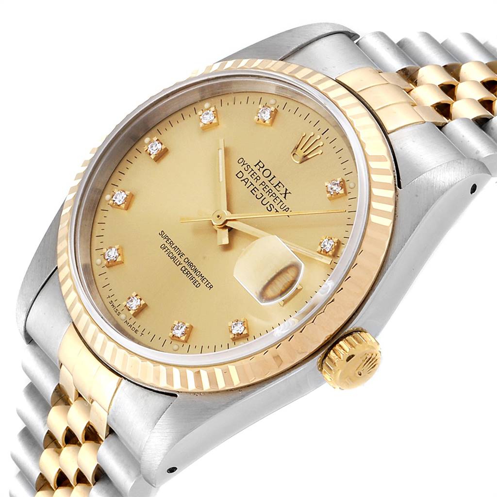 The image shows a Rolex Datejust 16233 Men
s Steel and Gold (two tone) Champagne Dial 16233 Men
s Steel and Gold (two tone) Champagne Dial watch at a slight angle, highlighting its gold dial, date display, bezel, and two-tone bracelet.