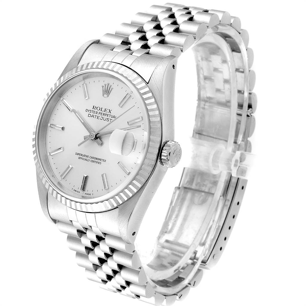 The image shows a side angle of the Rolex Datejust 16234 Men's Stainless Steel Silver Dial 16234 Men's Stainless Steel Silver Dial watch featuring its face, fluted bezel, crown, and Jubilee bracelet.