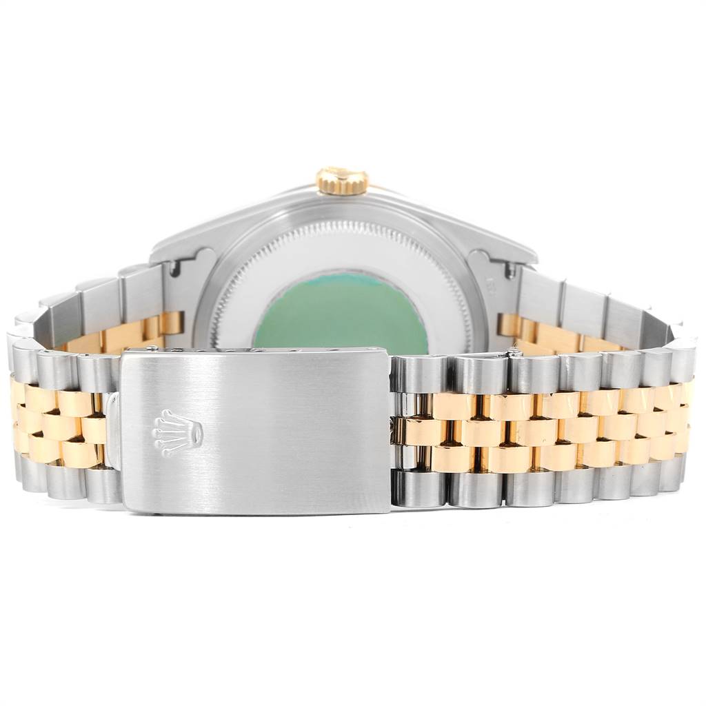 This image shows the back of the Rolex Datejust 16233 Men's Steel and Gold (two tone) Champagne Dial 16233 Men's Steel and Gold (two tone) Champagne Dial watch, highlighting the case and two-tone bracelet with clasp.