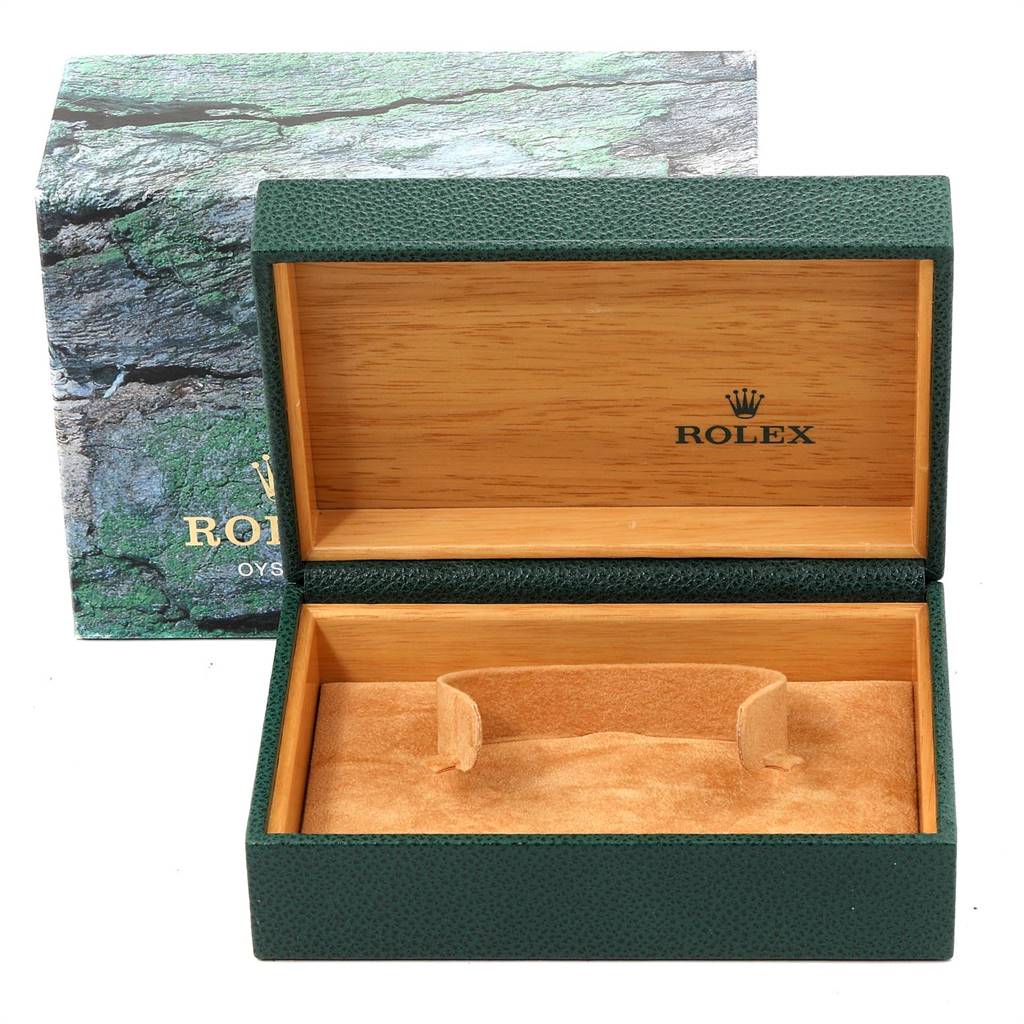 The image shows an open Rolex Datejust 16234 Men's Stainless Steel White Dial 16234 Men's Stainless Steel White Dial model watch box with a green exterior and wooden interior.