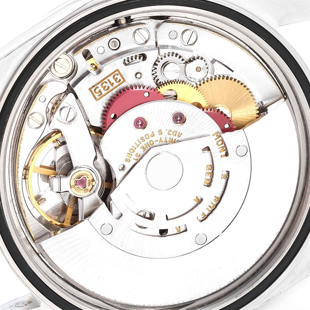 This image shows the internal mechanical movement of a Rolex Datejust 16233 Men
s Steel and Gold (two tone) Champagne Dial 16233 Men
s Steel and Gold (two tone) Champagne Dial watch viewed from the back.