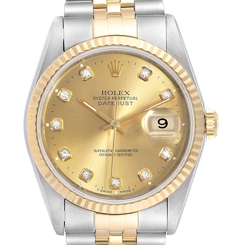 The image shows the front view of a Rolex Datejust 16233 Men
s Steel and Gold (two tone) Champagne Dial 16233 Men
s Steel and Gold (two tone) Champagne Dial watch, highlighting the face, bezel, and part of the bracelet.