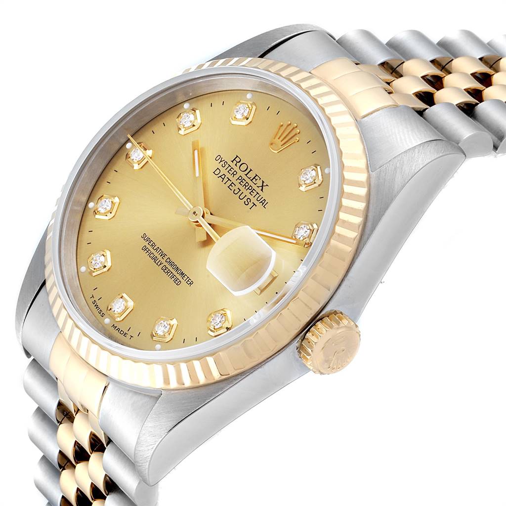 The image shows a close-up angle of the Rolex Datejust 16233 Men
s Steel and Gold (two tone) Champagne Dial 16233 Men
s Steel and Gold (two tone) Champagne Dial model, highlighting the dial, crown, and part of the bracelet.