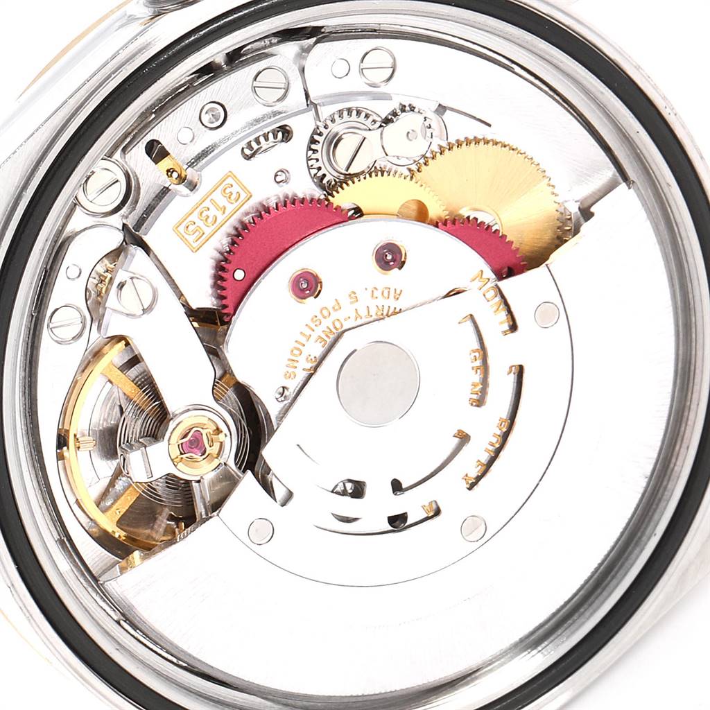 This image shows the internal movement mechanism of a Rolex Datejust 16233 Men's Steel and Gold (two tone) Blue Dial 16233 Men's Steel and Gold (two tone) Blue Dial watch viewed from the back.