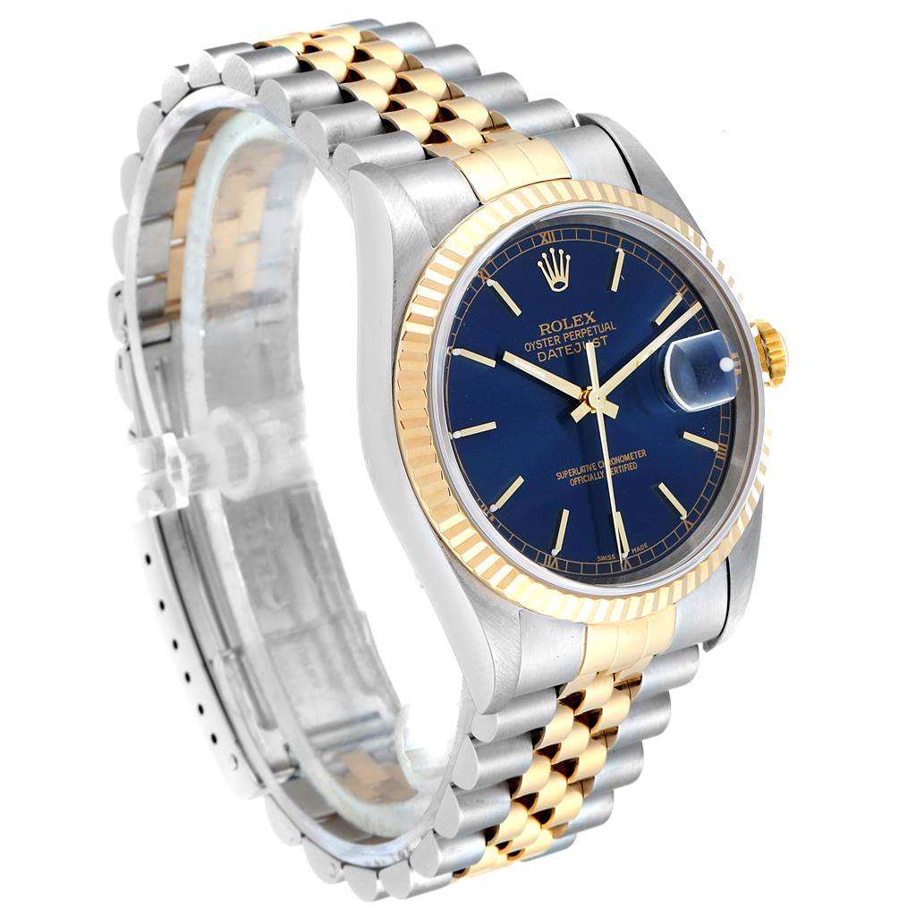 This Rolex Datejust 16233 Men's Steel and Gold (two tone) Blue Dial 16233 Men's Steel and Gold (two tone) Blue Dial watch is shown from a front-left angle, highlighting its bezel, dial, and two-tone bracelet.