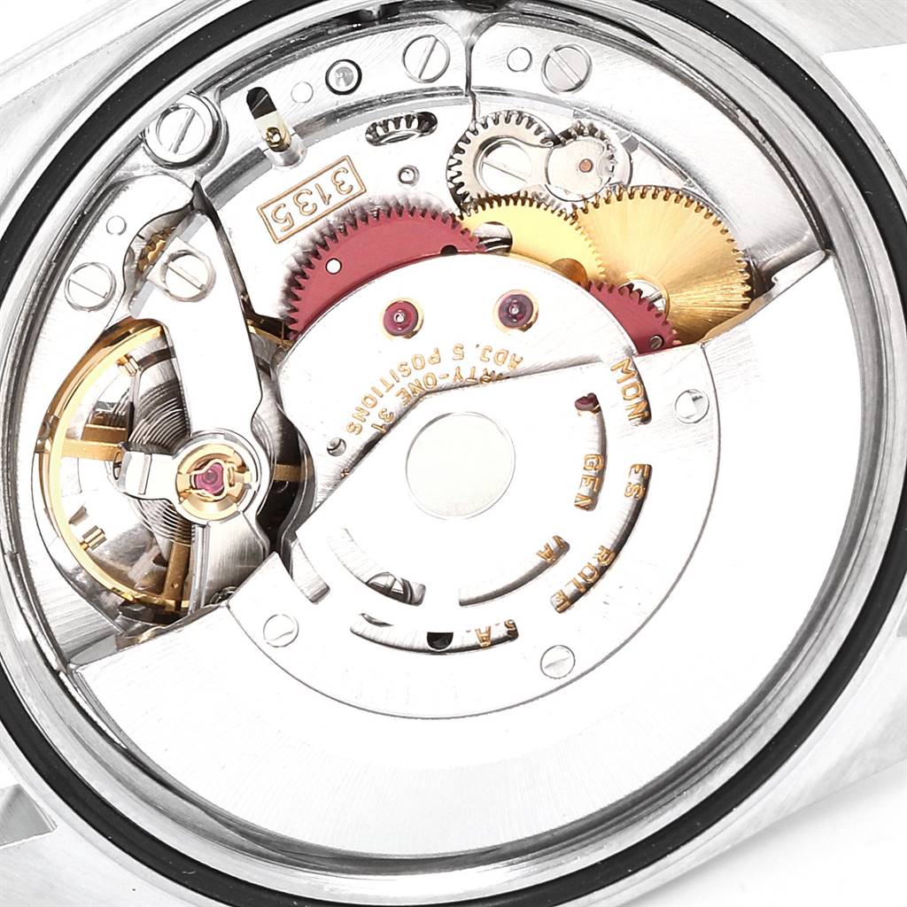 This image shows the internal mechanism of a Rolex Datejust 16233 Men
s Steel and Gold (two tone) Black Dial 16233 Men
s Steel and Gold (two tone) Black Dial watch from the back, highlighting gears and movement parts.