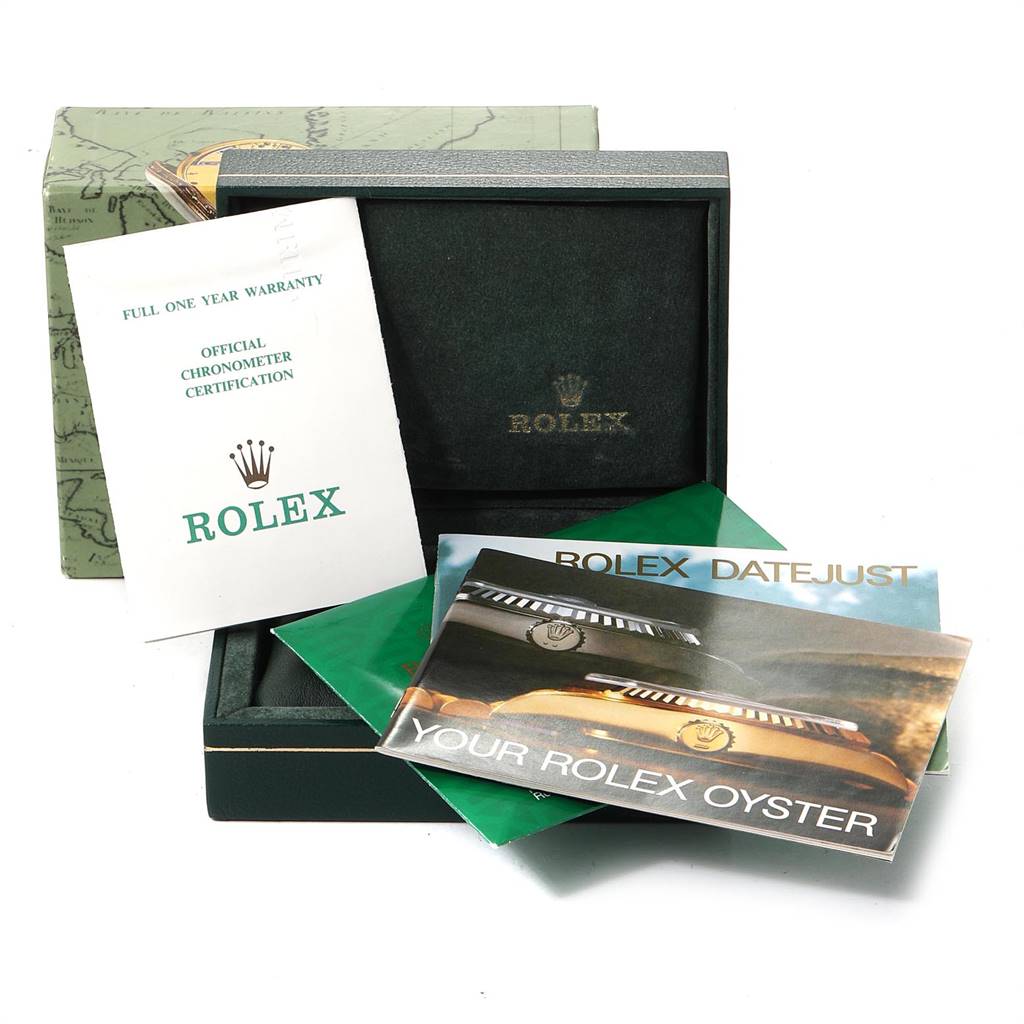 The image shows the box and warranty papers for a Rolex Datejust 16233 Men
s Steel and Gold (two tone) Black Dial 16233 Men
s Steel and Gold (two tone) Black Dial model, with booklets and certification.