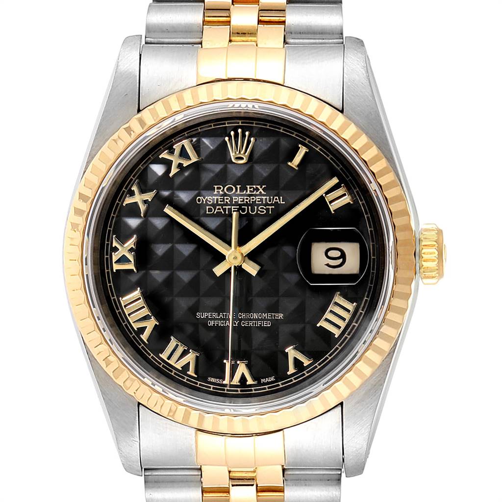 This image displays a front view of a Rolex Datejust 16233 Men
s Steel and Gold (two tone) Black Dial 16233 Men
s Steel and Gold (two tone) Black Dial watch, showcasing its black dial, gold fluted bezel, and two-tone bracelet.