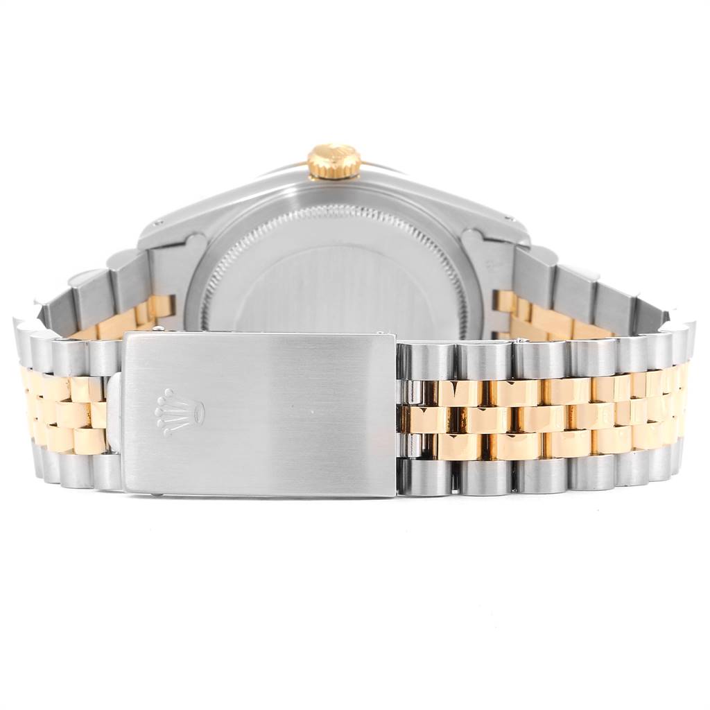 This image shows the back view of a Rolex Datejust 16233 Men
s Steel and Gold (two tone) Black Dial 16233 Men
s Steel and Gold (two tone) Black Dial watch
s case and two-tone metal Jubilee bracelet with the clasp closed.