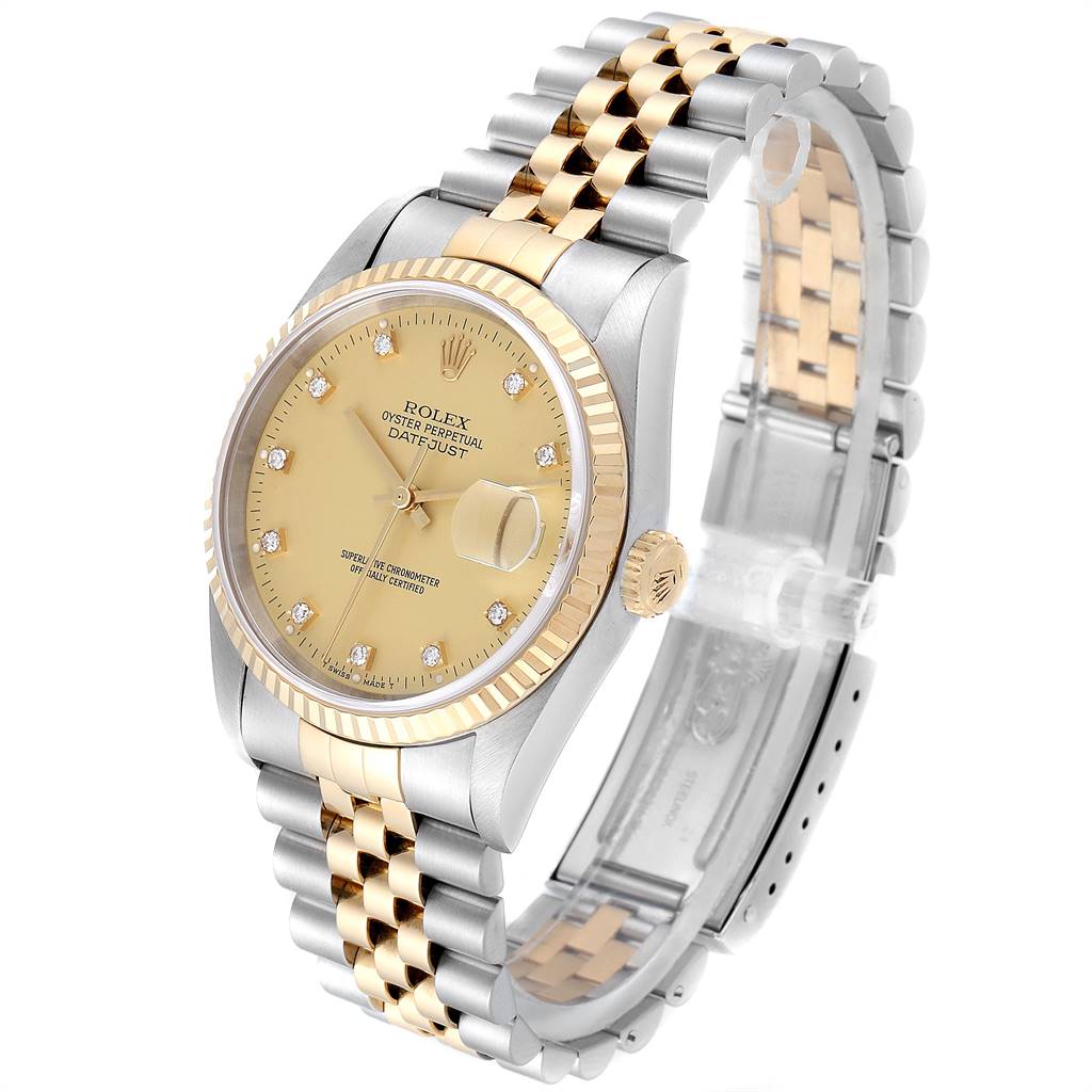 This image shows a Rolex Datejust 16233 Men's Steel and Gold (two tone) Champagne Dial 16233 Men's Steel and Gold (two tone) Champagne Dial watch angled to display the gold dial, two-tone bracelet, and fluted bezel.