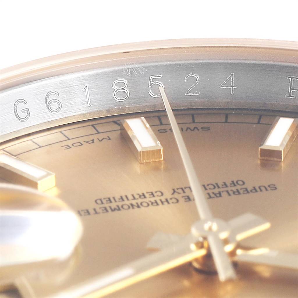 This close-up angle shows the serial number engraving on the rehaut and partial dial of the Rolex Datejust 116233 Men's Stainless Steel Champagne Dial 116233 Men's Stainless Steel Champagne Dial watch.