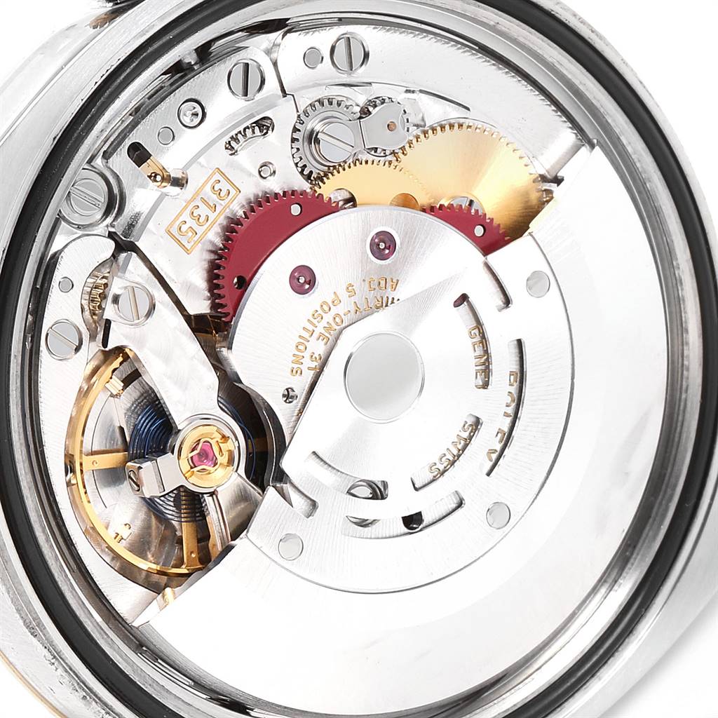 This image shows a close-up view of the movement mechanism inside a Rolex Datejust 116233 Men's Stainless Steel Champagne Dial 116233 Men's Stainless Steel Champagne Dial watch.