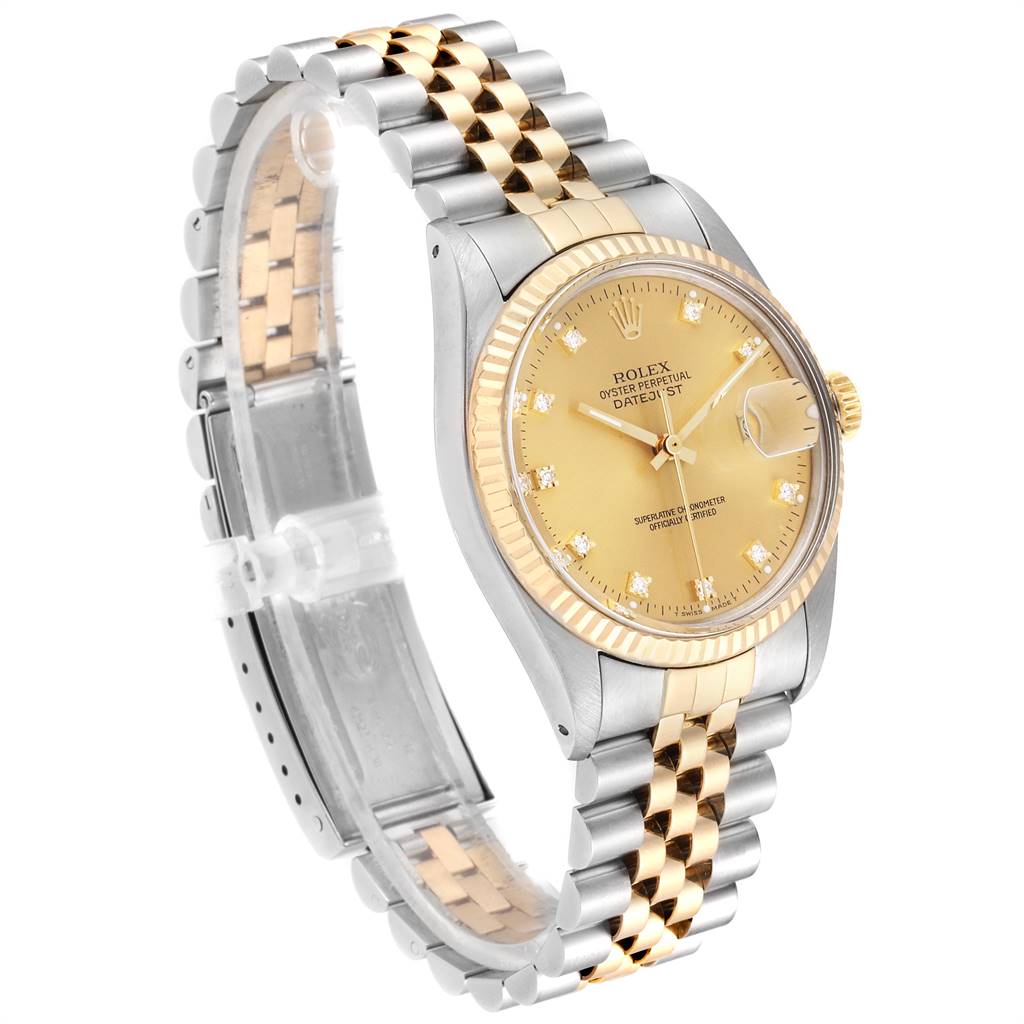 This Rolex Datejust 16013 Men's Stainless Steel Champagne Dial 16013 Men's Stainless Steel Champagne Dial watch is shown at an angle highlighting the dial, bezel, crown, and the two-tone bracelet.