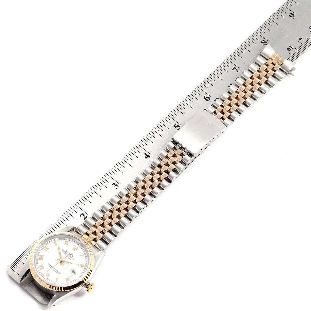 The image shows a Rolex Datejust 16233 Men's Steel and Gold (two tone) White Dial 16233 Men's Steel and Gold (two tone) White Dial watch laid flat with a two-tone bracelet, measured against a ruler.