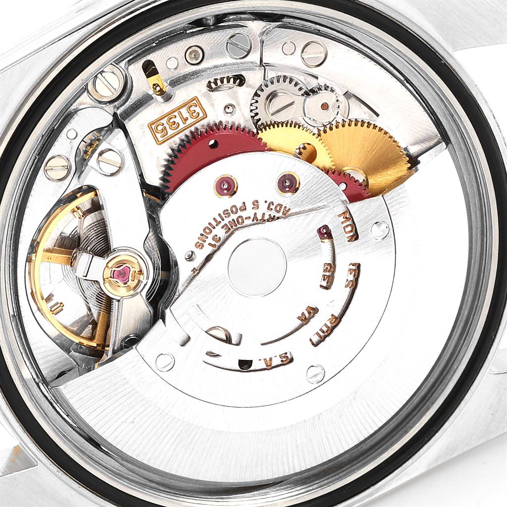 This image shows the internal mechanism from the back angle of a Rolex Datejust 16233 Men's Steel and Gold (two tone) White Dial 16233 Men's Steel and Gold (two tone) White Dial watch.