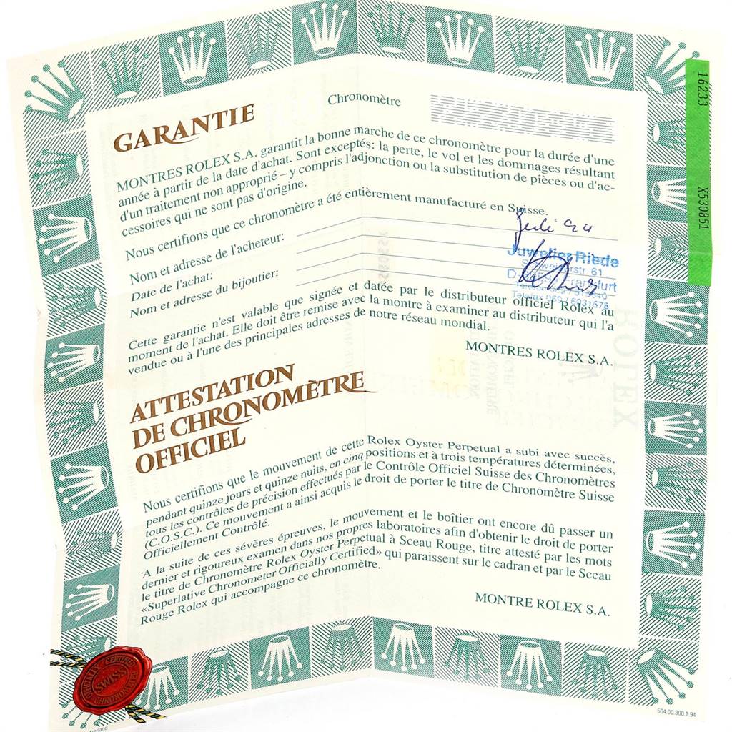 This image shows an official chronometer certificate and guarantee paperwork for a Rolex Datejust 16233 Men's Steel and Gold (two tone) White Dial 16233 Men's Steel and Gold (two tone) White Dial watch.