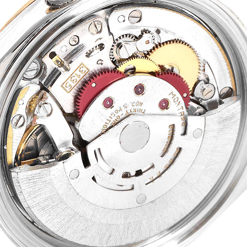 The image shows the intricate movement mechanism of a Rolex Datejust 16233 Men's Steel and Gold (two tone) Black Dial 16233 Men's Steel and Gold (two tone) Black Dial watch, viewed from the back.