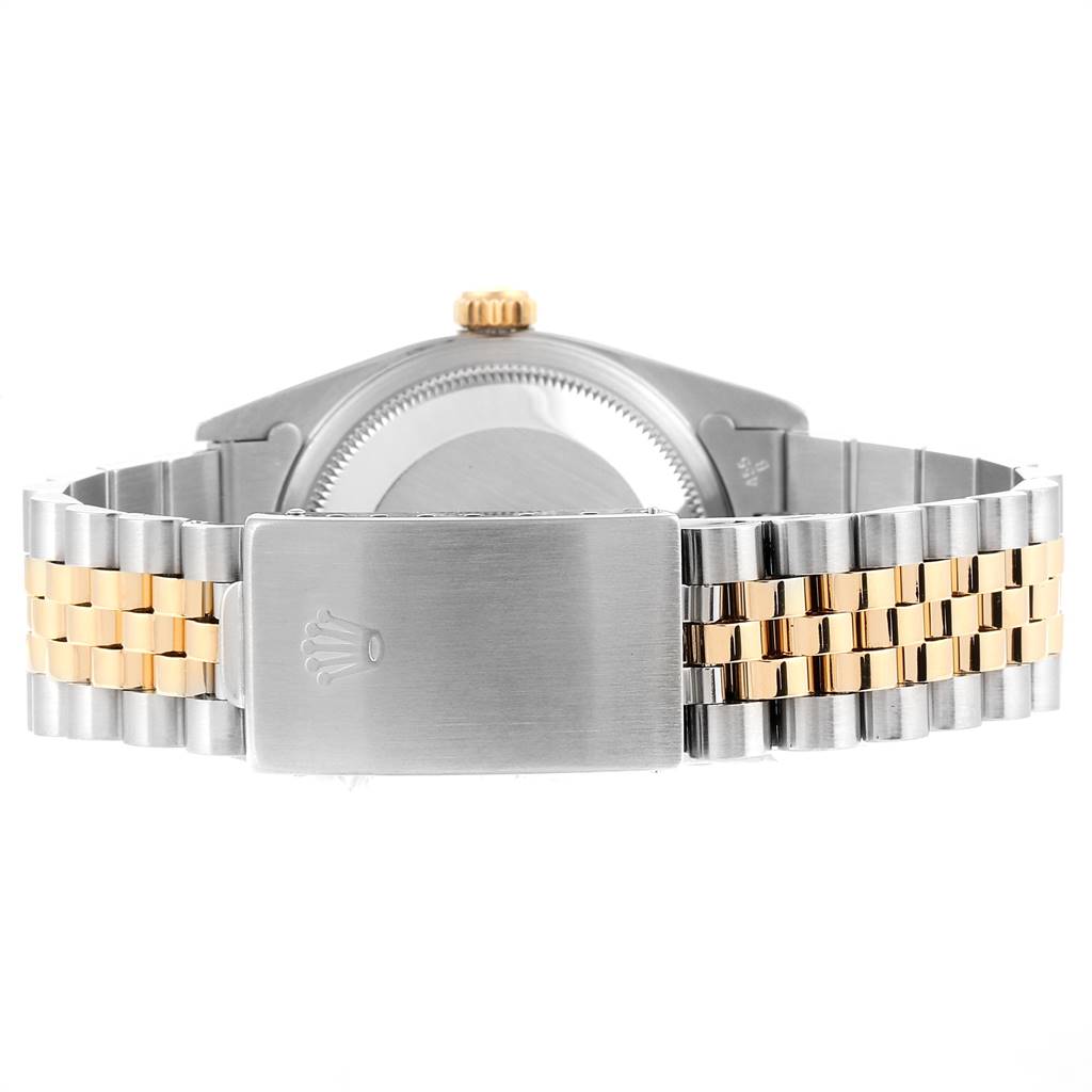 The image shows the back clasp and bracelet of the Rolex Datejust 16233 Men's Steel and Gold (two tone) Black Dial 16233 Men's Steel and Gold (two tone) Black Dial watch, featuring a two-tone design.