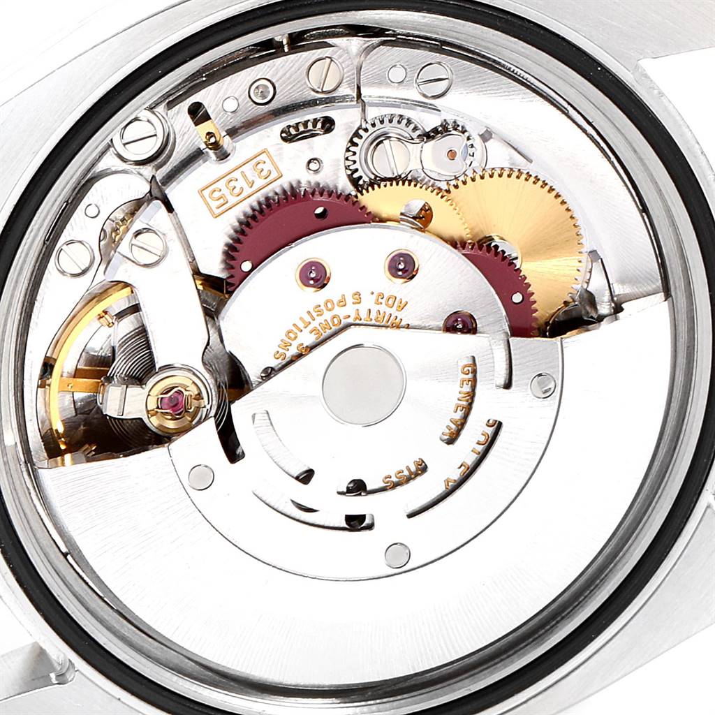 This image shows the intricate internal mechanism of a Rolex Datejust 116233 Men's Stainless Steel Champagne Dial 116233 Men's Stainless Steel Champagne Dial watch viewed from the back.