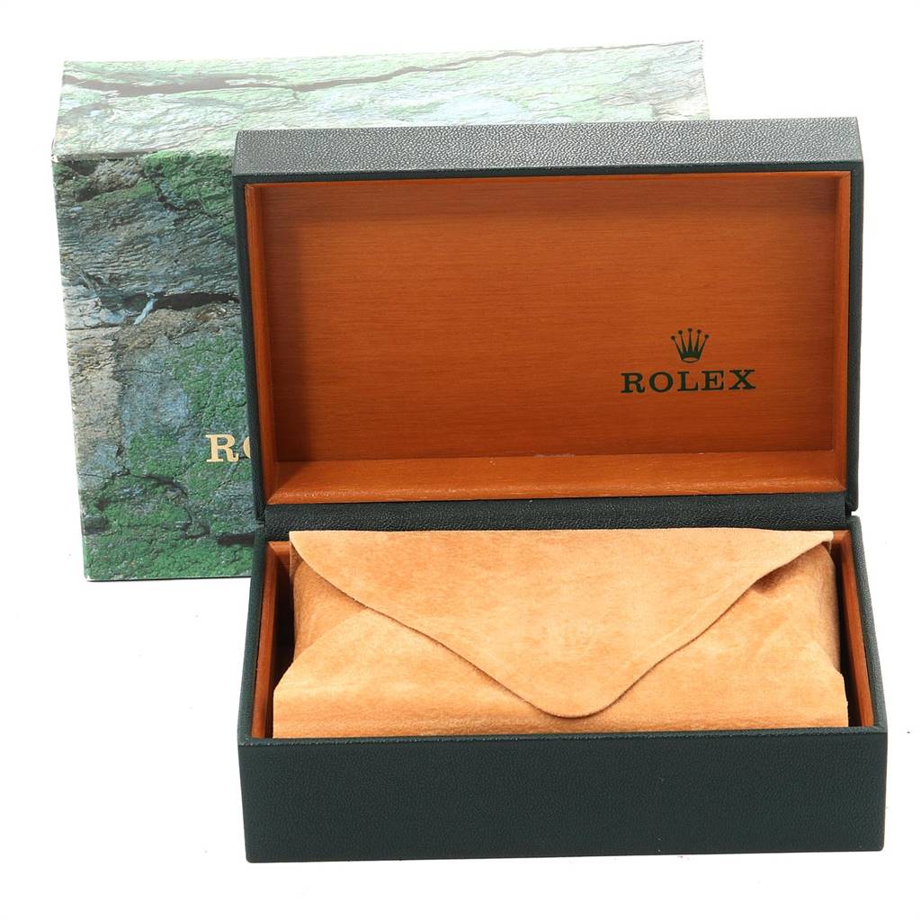 This image shows an open Rolex Datejust 16233 Men
s Steel and Gold (two tone) Champagne Dial 16233 Men
s Steel and Gold (two tone) Champagne Dial watch box with a protective pouch inside.