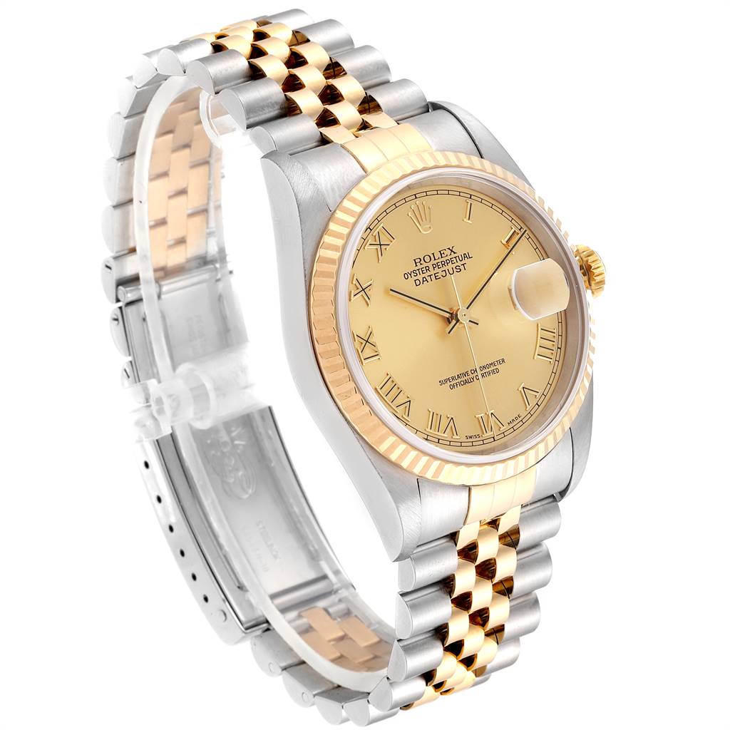 The image shows a Rolex Datejust 16233 Men
s Steel and Gold (two tone) Champagne Dial 16233 Men
s Steel and Gold (two tone) Champagne Dial watch, featuring its gold and silver Jubilee bracelet, bezel, case, and champagne dial.