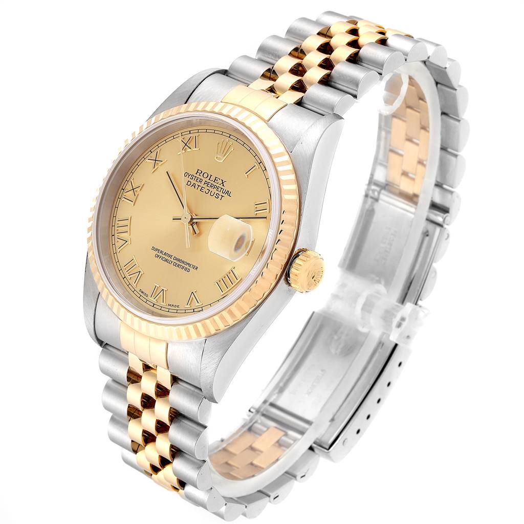 This is an angled view of a Rolex Datejust 16233 Men
s Steel and Gold (two tone) Champagne Dial 16233 Men
s Steel and Gold (two tone) Champagne Dial watch, highlighting its two-tone bracelet, fluted bezel, and champagne dial.