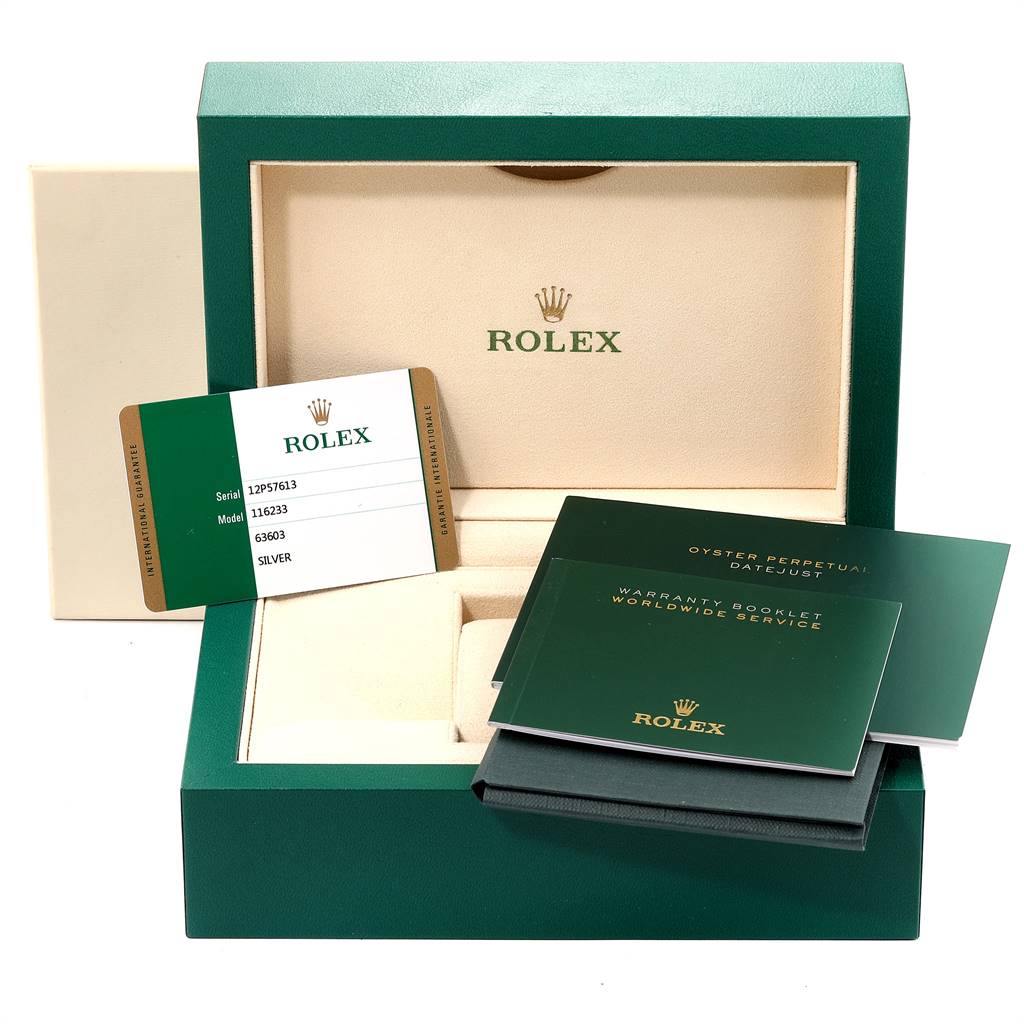 The image shows the packaging materials for a Rolex Datejust 116233 Men's Stainless Steel Silver Dial 116233 Men's Stainless Steel Silver Dial, including an open box, warranty card, and booklets.
