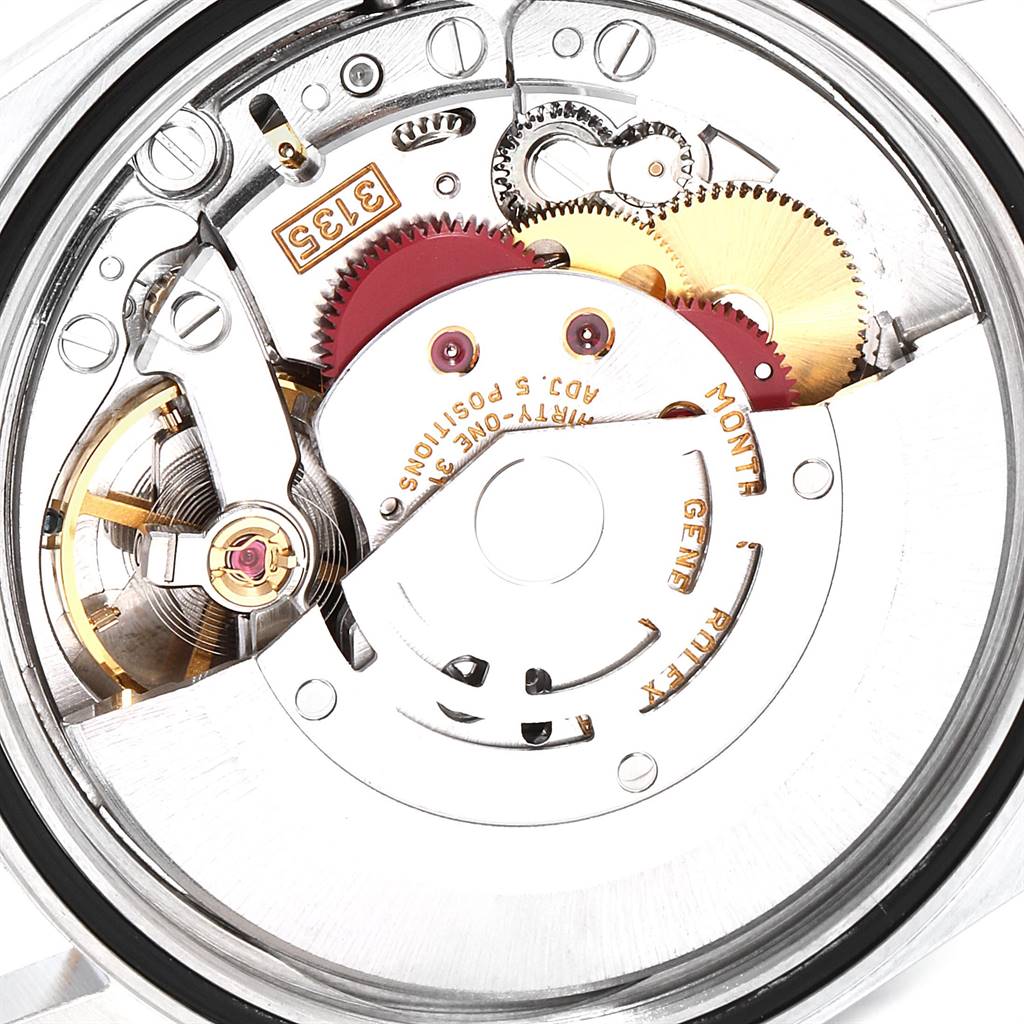 This image shows an internal view of the Rolex Datejust 16233 Men's Steel and Gold (two tone) Grey Dial 16233 Men's Steel and Gold (two tone) Grey Dial watch mechanism from a top-down angle.