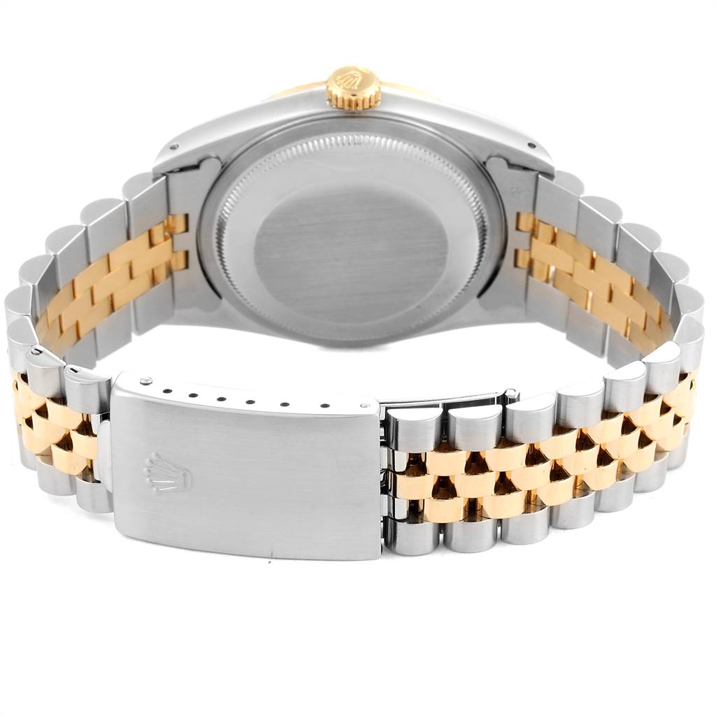 This image shows the back view of a Rolex Datejust 16233 Men's Steel and Gold (two tone) Silver Dial 16233 Men's Steel and Gold (two tone) Silver Dial watch, focusing on its case back and bi-metal bracelet.