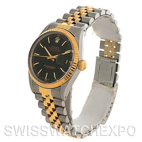 The image shows a side angle of a Rolex Datejust 16013 Men's Stainless Steel Black Dial 16013 Men's Stainless Steel Black Dial watch, displaying its two-tone stainless steel and gold bracelet, black dial, and fluted bezel.