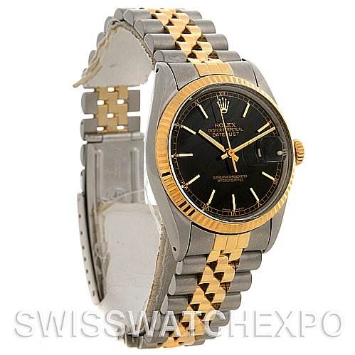 The Rolex Datejust 16013 Men's Stainless Steel Black Dial 16013 Men's Stainless Steel Black Dial watch is shown at a three-quarter angle, displaying the watch face, bezel, and two-tone bracelet.