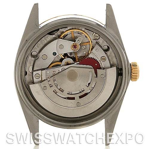 The image shows the inner mechanism and movement components of a Rolex Datejust 16013 Men's Stainless Steel Black Dial 16013 Men's Stainless Steel Black Dial model watch from the back.