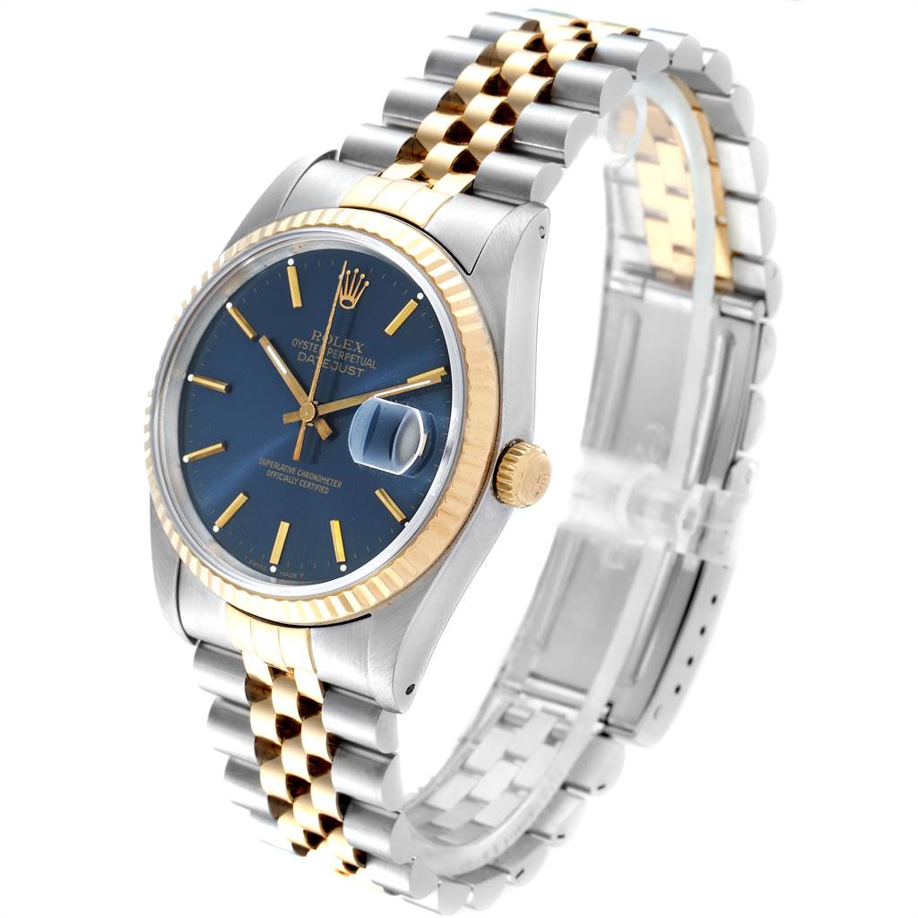 The image shows a Rolex Datejust 16233 Men
s Steel and Gold (two tone) Blue Dial 16233 Men
s Steel and Gold (two tone) Blue Dial watch at a three-quarter angle, highlighting the face, bezel, crown, and bracelet.
