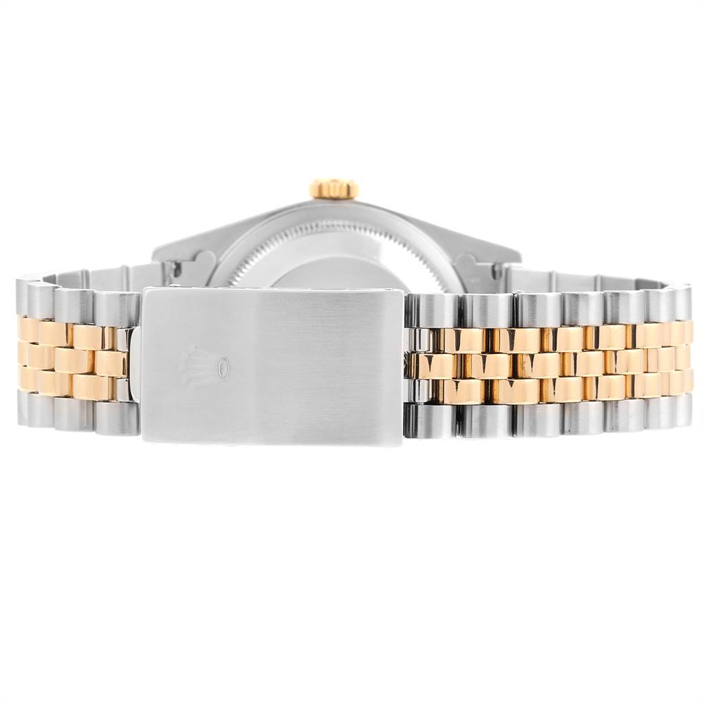 The image shows the back view of a Rolex Datejust 16233 Men's Steel and Gold (two tone) Beige Dial 16233 Men's Steel and Gold (two tone) Beige Dial watch, highlighting its bi-metal bracelet and clasp.