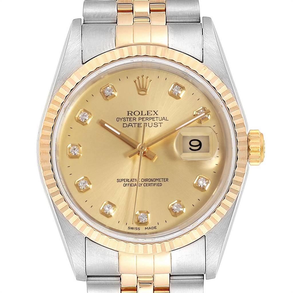 The image shows a close-up view of the Rolex Datejust 16233 Men's Steel and Gold (two tone) Champagne Dial 16233 Men's Steel and Gold (two tone) Champagne Dial watch, highlighting its gold dial, diamond hour markers, and two-tone bracelet.