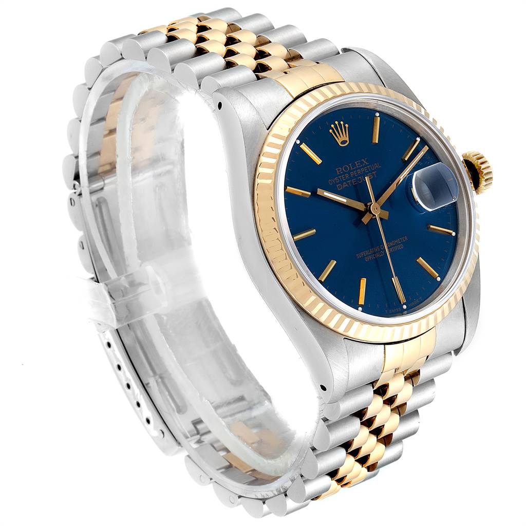 This Rolex Datejust 16233 Men's Steel and Gold (two tone) Blue Dial 16233 Men's Steel and Gold (two tone) Blue Dial watch is shown at an angle displaying the bracelet, crown, bezel, and face.