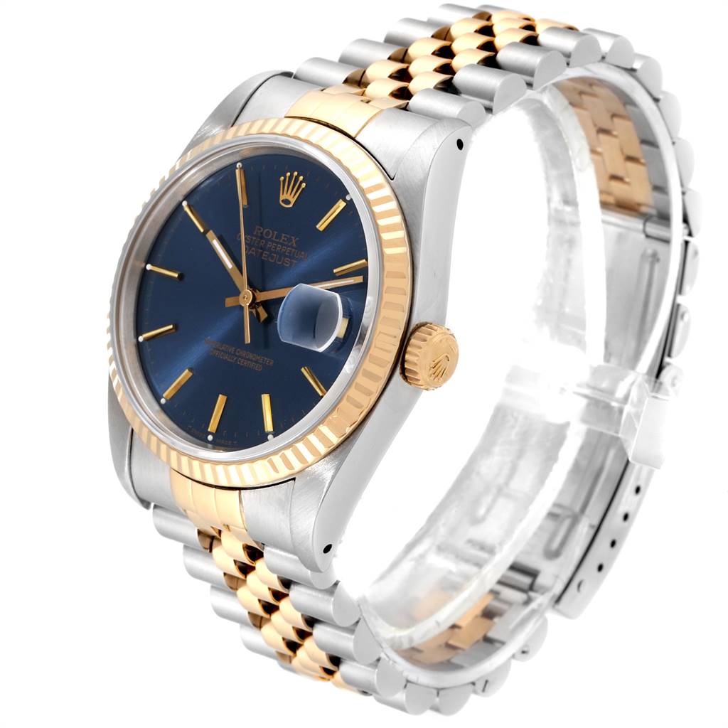 This image shows a side angled view of a Rolex Datejust 16233 Men's Steel and Gold (two tone) Blue Dial 16233 Men's Steel and Gold (two tone) Blue Dial watch, displaying its dial, bracelet, and crown.