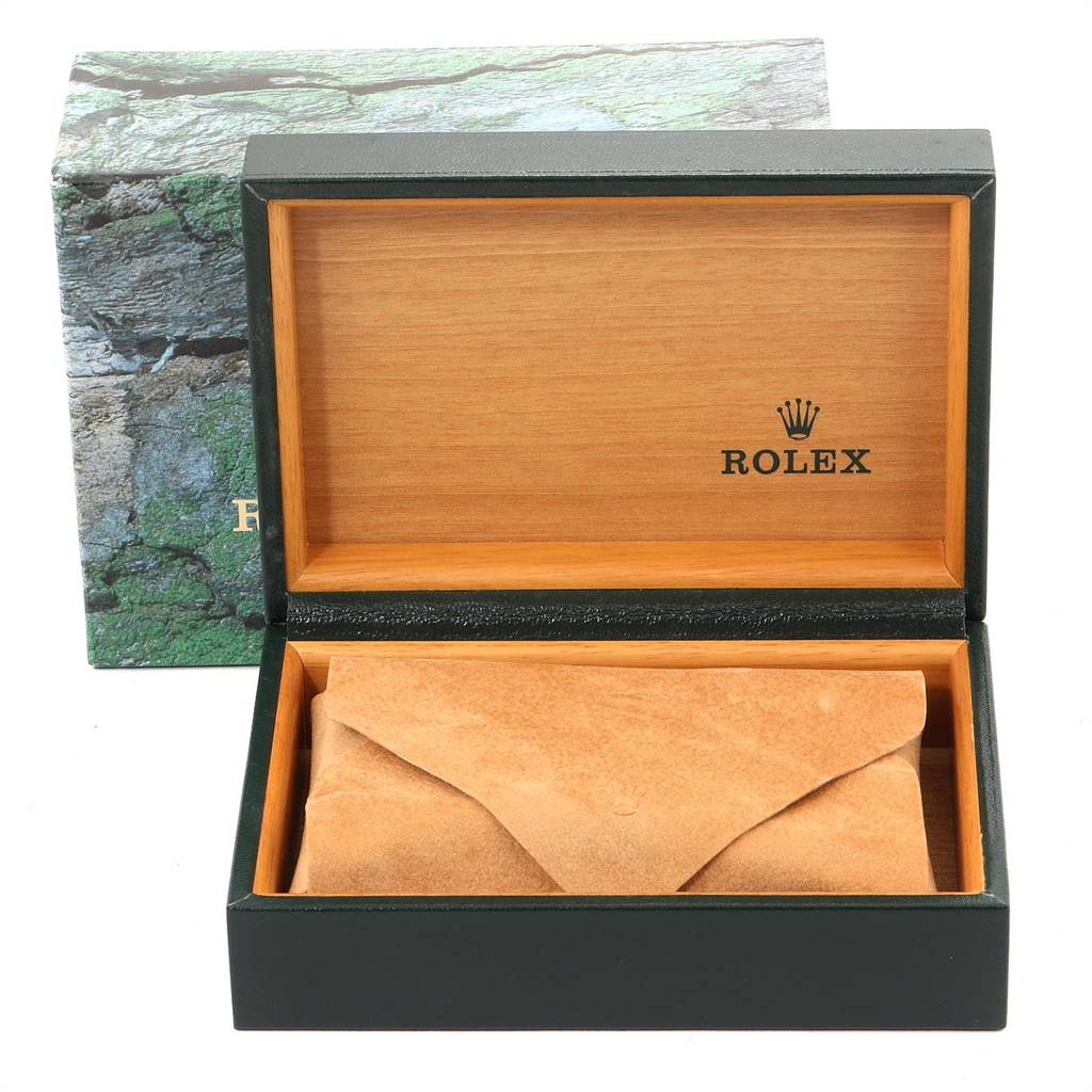 The image shows a Rolex Datejust 16233 Men's Steel and Gold (two tone) Blue Dial 16233 Men's Steel and Gold (two tone) Blue Dial watch box and leather pouch, with the lid open to display the interior.