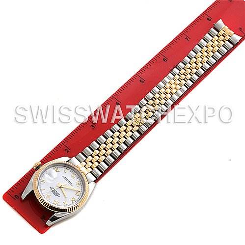 The image shows a top-down view of a Rolex Datejust 116233 Men's Stainless Steel White Dial 116233 Men's Stainless Steel White Dial watch, displaying the face, bezel, and full bracelet alongside a measuring ruler.