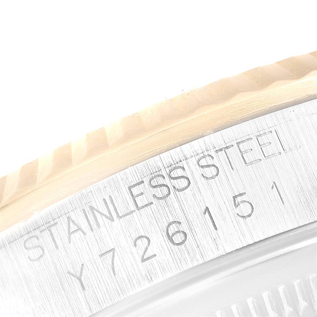 This image shows a close-up of the stainless steel case back with serial number engravings of the Rolex Datejust 16233 Men's Steel and Gold (two tone) Grey Dial 16233 Men's Steel and Gold (two tone) Grey Dial model watch.