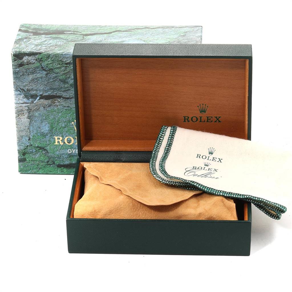 The image shows the open box and cleaning cloth accessories for a Rolex Datejust 16234 Men's Stainless Steel Silver Dial 16234 Men's Stainless Steel Silver Dial watch.