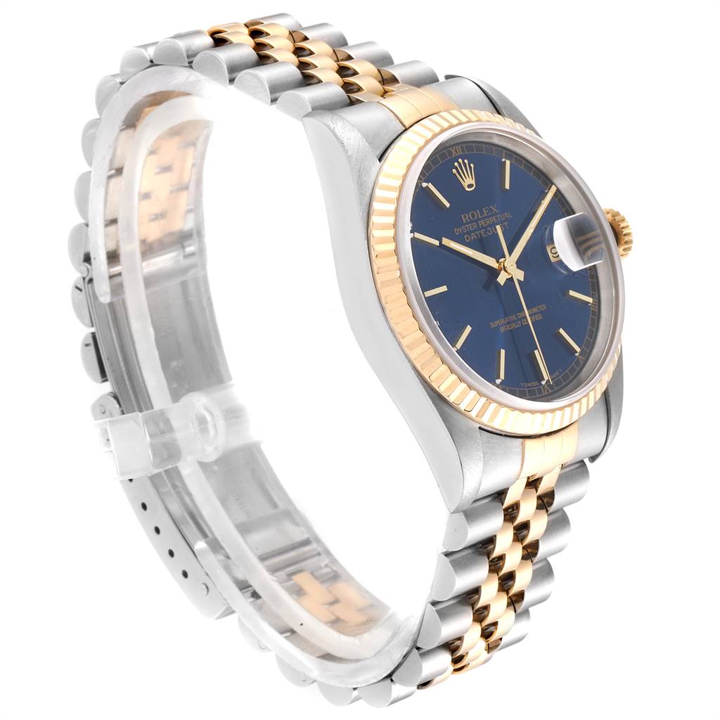 This image shows a side angle view of a Rolex Datejust 16233 Men's Steel and Gold (two tone) Blue Dial 16233 Men's Steel and Gold (two tone) Blue Dial watch, highlighting the bracelet, case, dial, bezel, and crown.